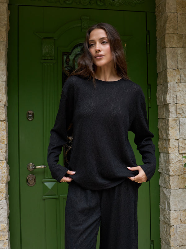 Black lace long-sleeve top from the MUSSONY summer collection