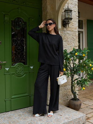 Relaxed black lace long-sleeve top in deep black