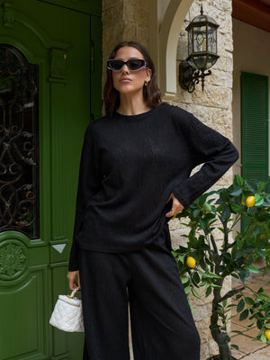 MUSSONY black lace top with long sleeves, relaxed cut
