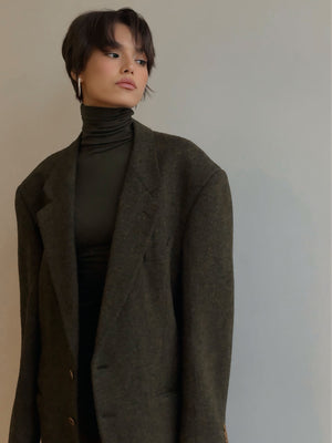 MUSSONY Lyocell Turtleneck in Dark Green — fitted turtleneck in 95% lyocell, look 2