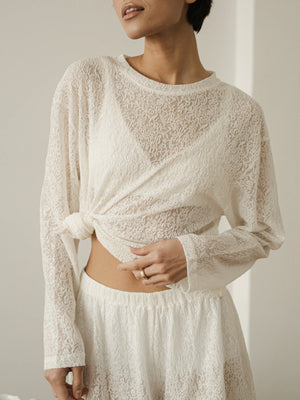 Ecru lace long-sleeve top by MUSSONY — styled for warm weather