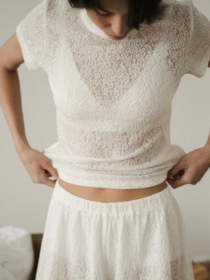Ecru lace short-sleeve top by MUSSONY — resort styling