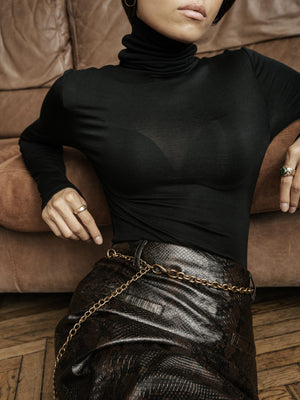 MUSSONY Lyocell Turtleneck in Black — fitted turtleneck in 95% lyocell, look 6