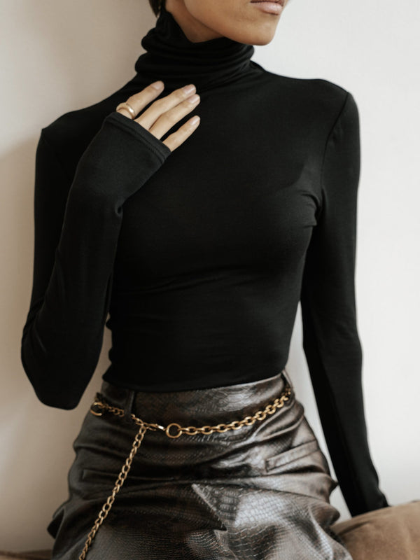 MUSSONY Lyocell Turtleneck in Black — fitted turtleneck in 95% lyocell, look 1