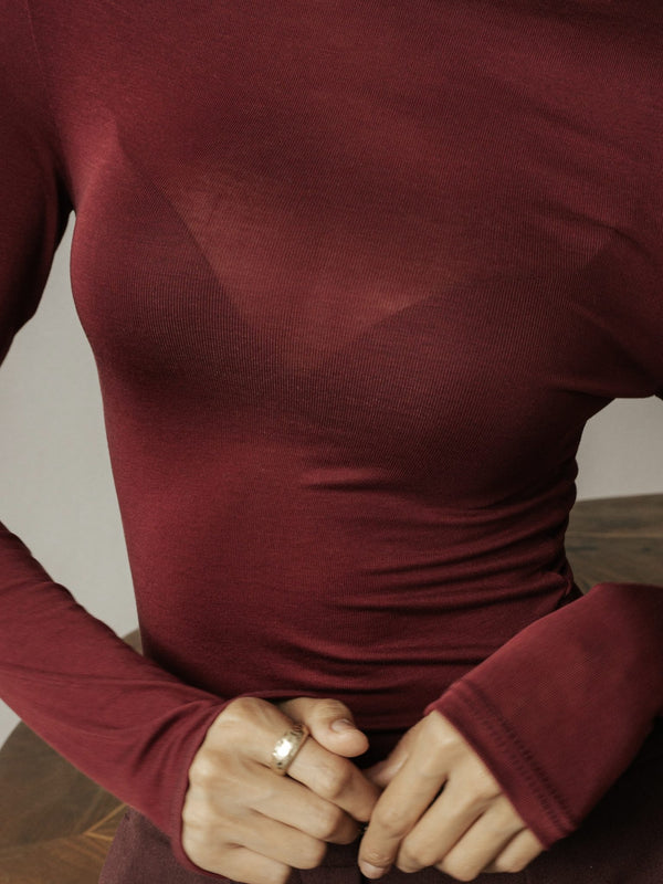 MUSSONY Lyocell Turtleneck in Burgundy — fitted turtleneck in 95% lyocell, look 8