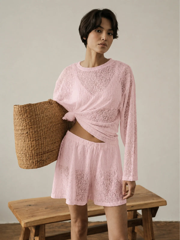 Blush pink lace shorts by MUSSONY on model, full-length look against a light backdrop